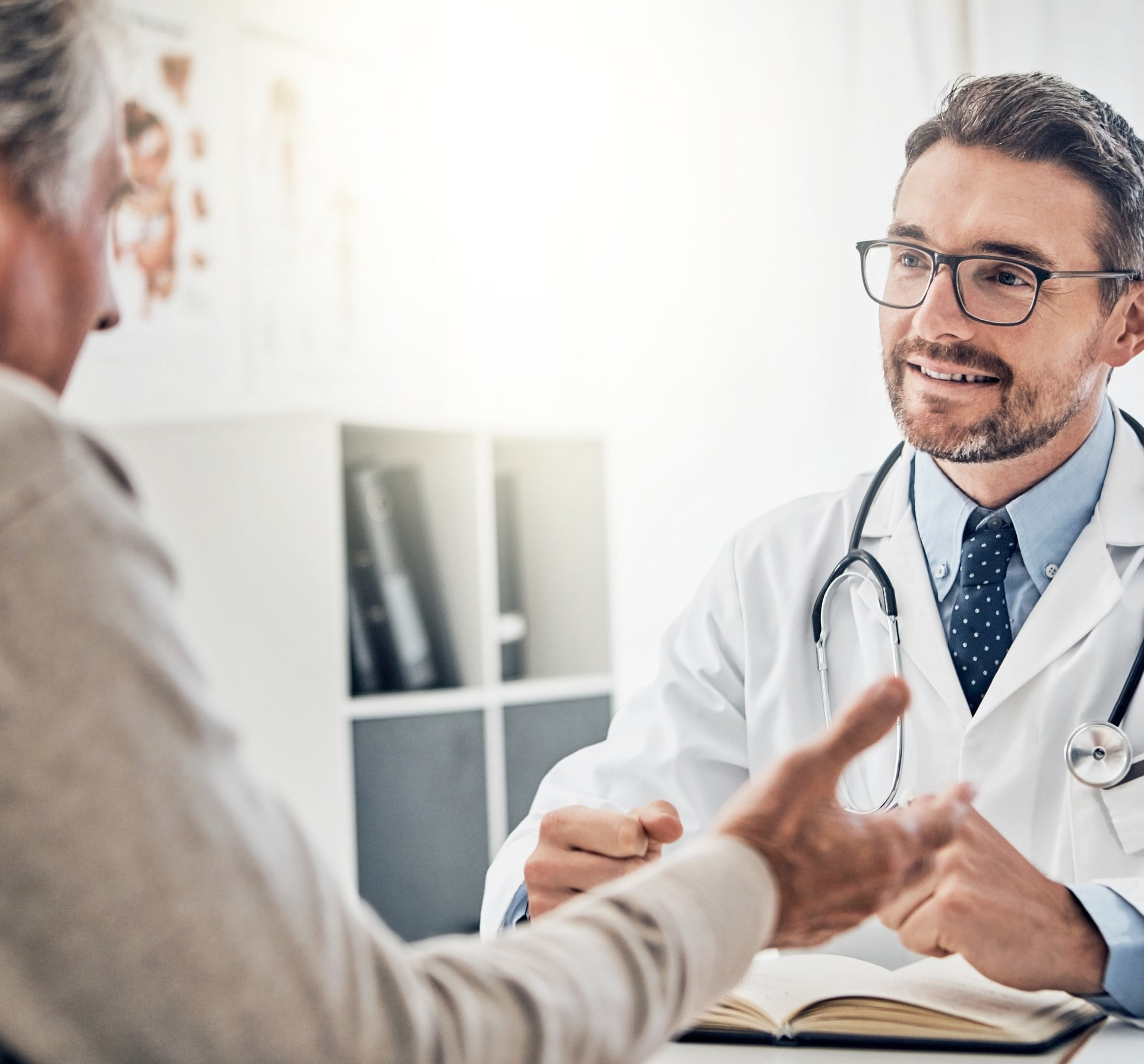 A doctor having a discussion with a patient