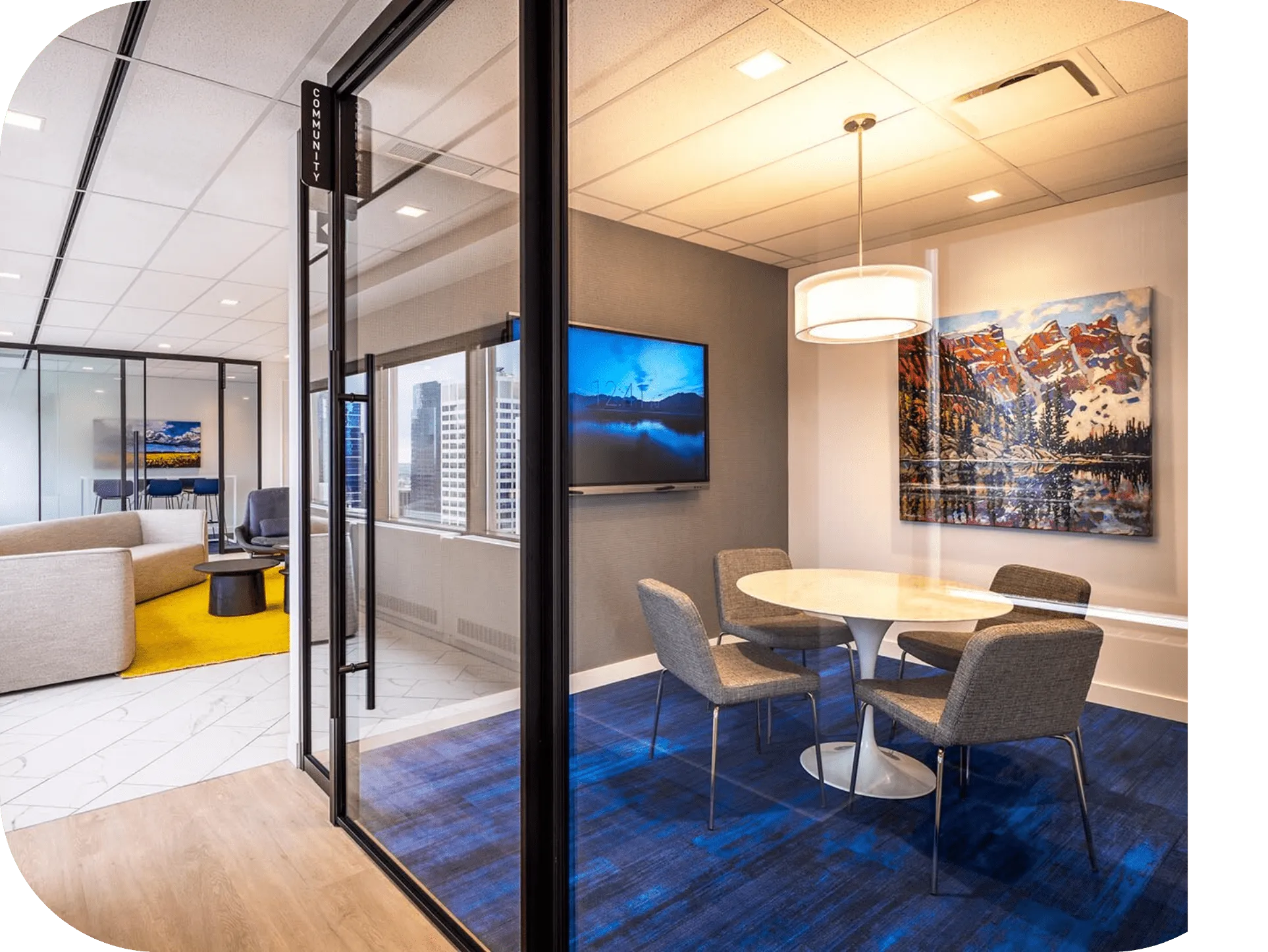 An image of a office with a desk and a chair.